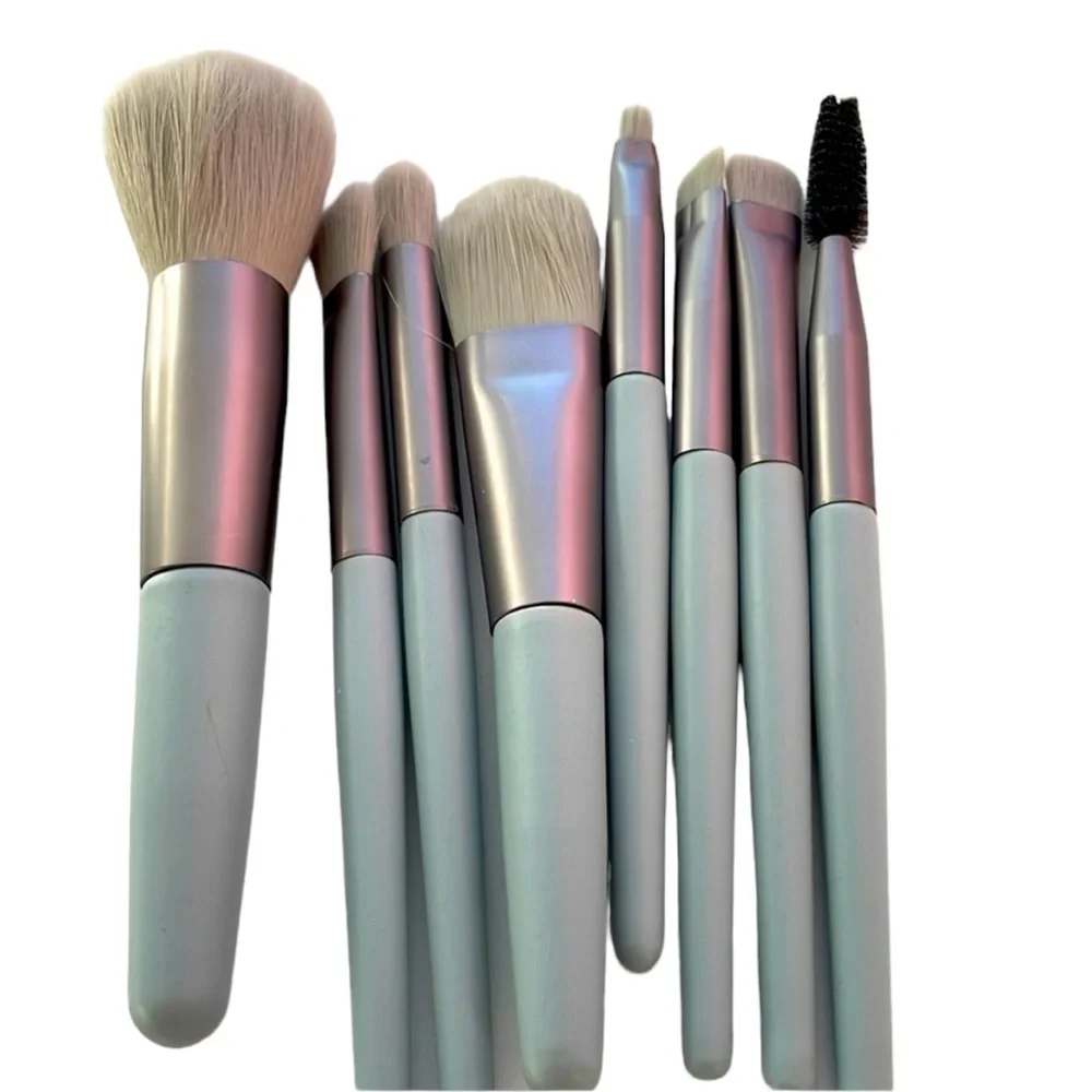 Set of travel size makeup brushes in ice blue travel envelope. New.
